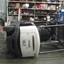 Crown forklift laying on its side during recovery service