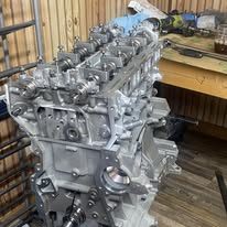Forklift engine rebuild on a workbench
