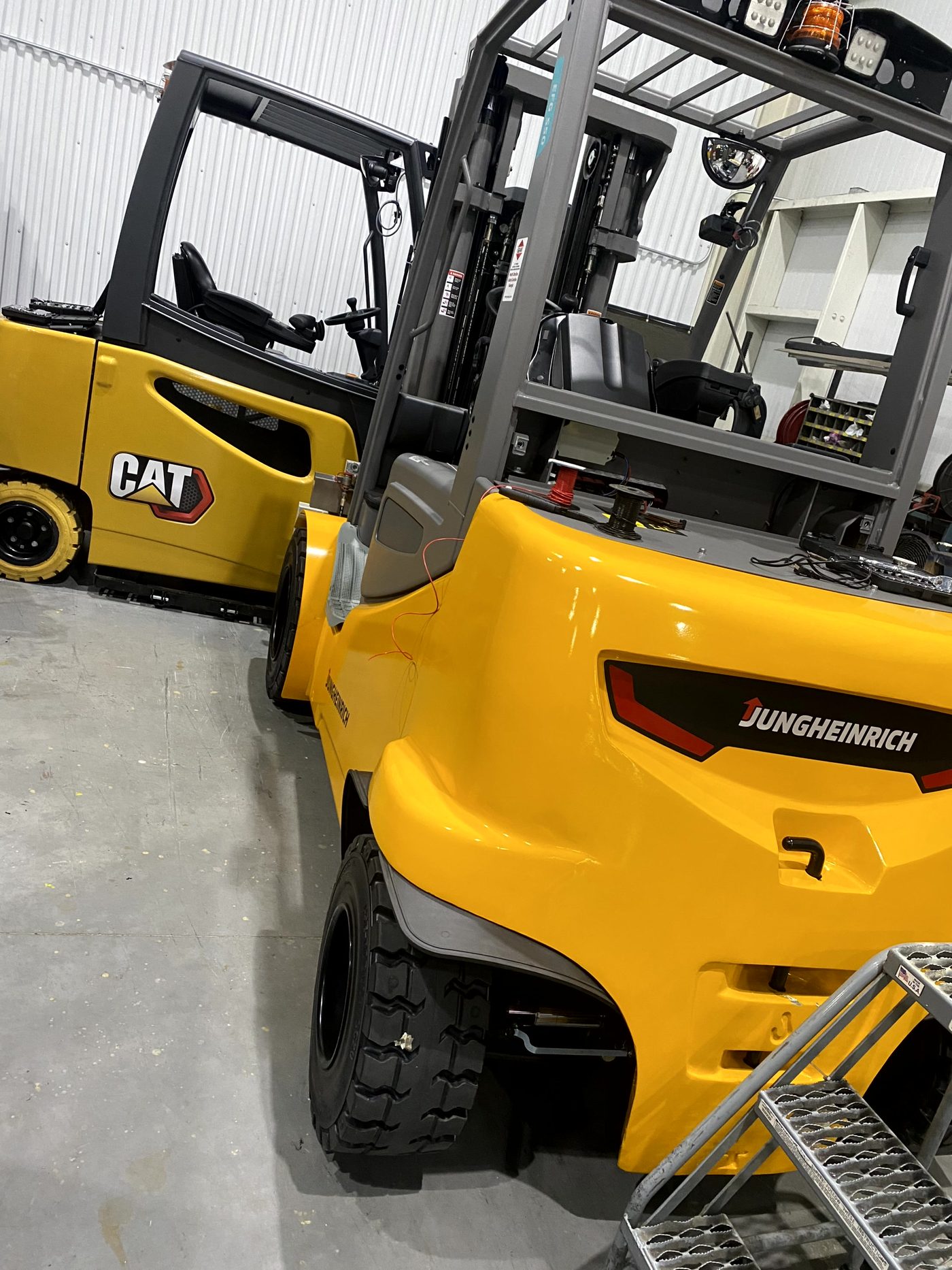 CAT and Jungheinrich forklifts in IronRidge service shop